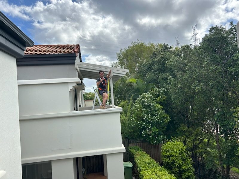 Done & Dusted Works performing body corporate maintenance at heights on a Gold Coast strata property